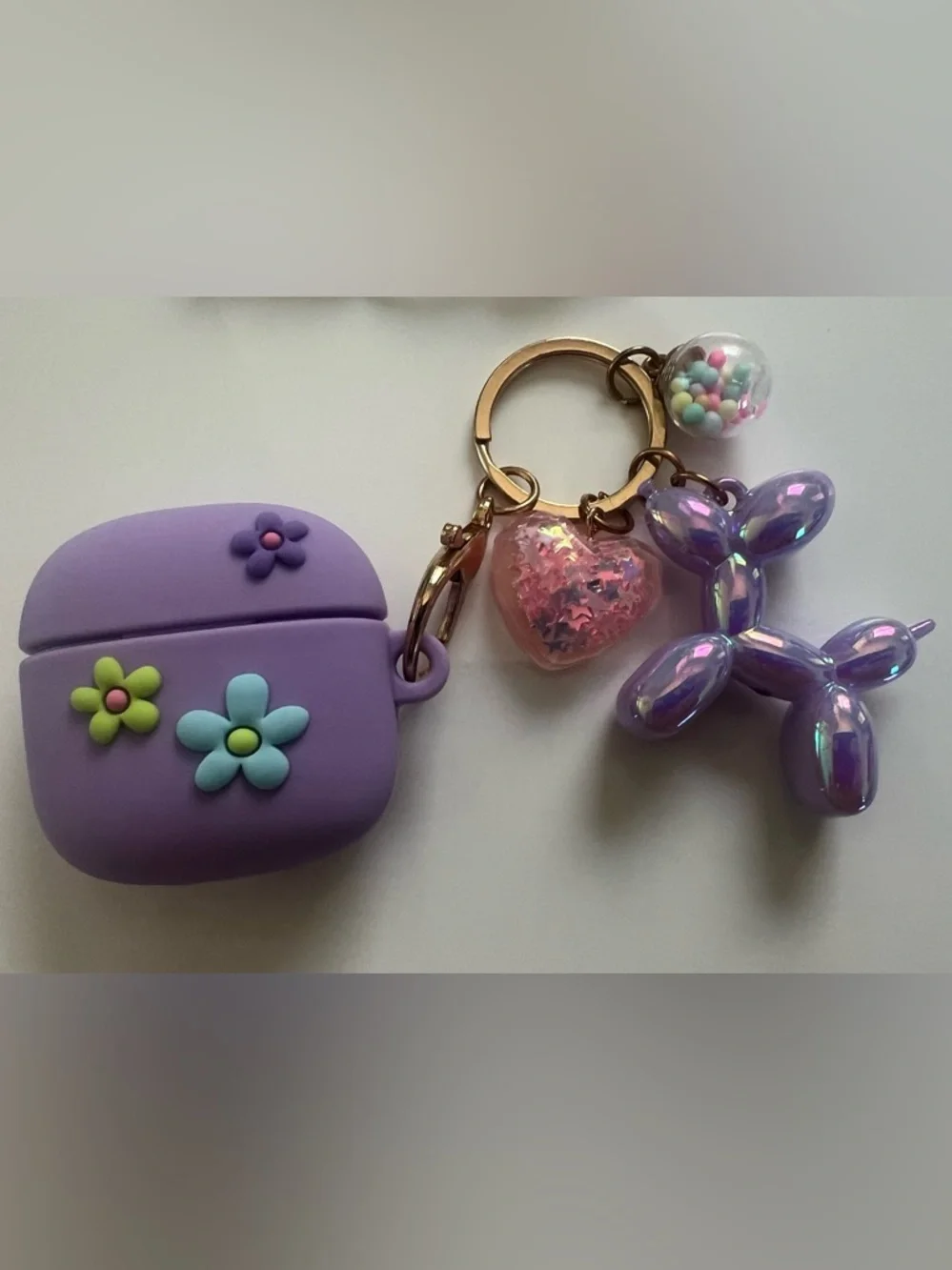 AirPods + Case Purple Floral + Charm Keychain + Purple Earbuds Bundle